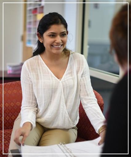 A Delaware Tech student meeting with an academic counselor